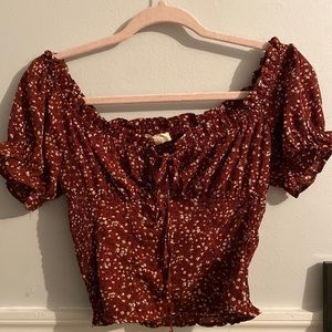 cropped Fitted Brown Top with Small blue flower detailing